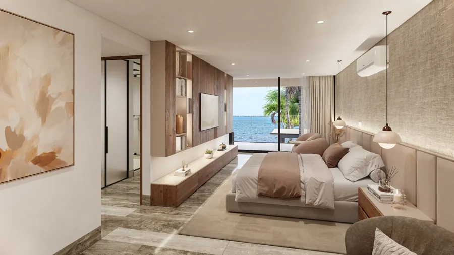 Recámara principal con acceso a una terraza y vista al mar